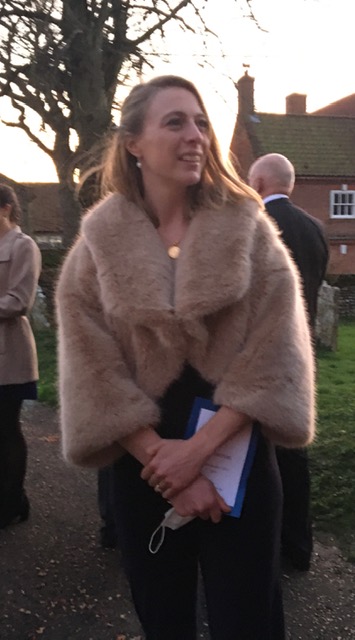 Guest in short beige mink jacket